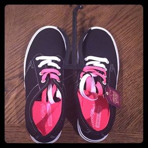 Black, white, and pink sneakers